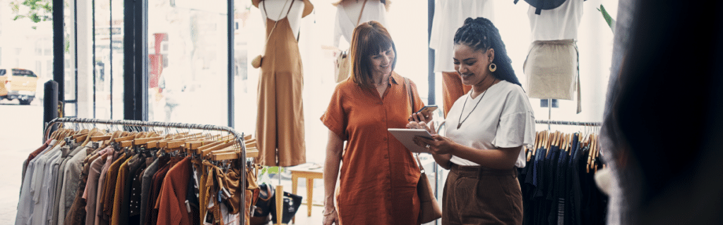 Two women exploring shopping experience