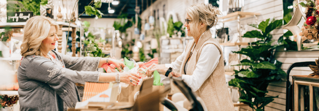 Cashier assisting customer at Homewares store